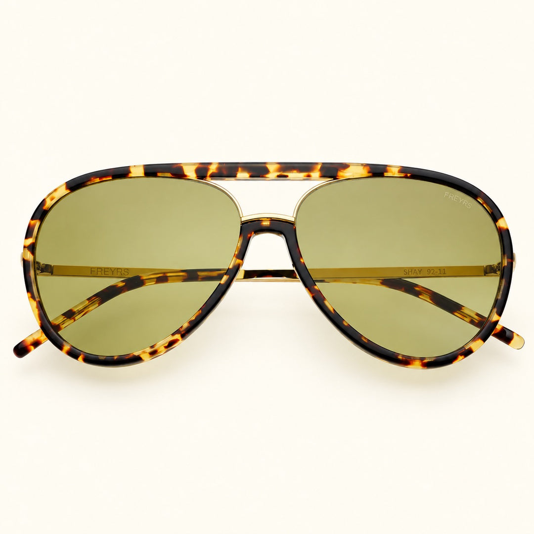 Front view of FREYRS Shay unisex aviator sunglasses in Tortoise / Light Green featuring tortoiseshell acetate frames, light green lenses, and a gold-tone double-bridge design.