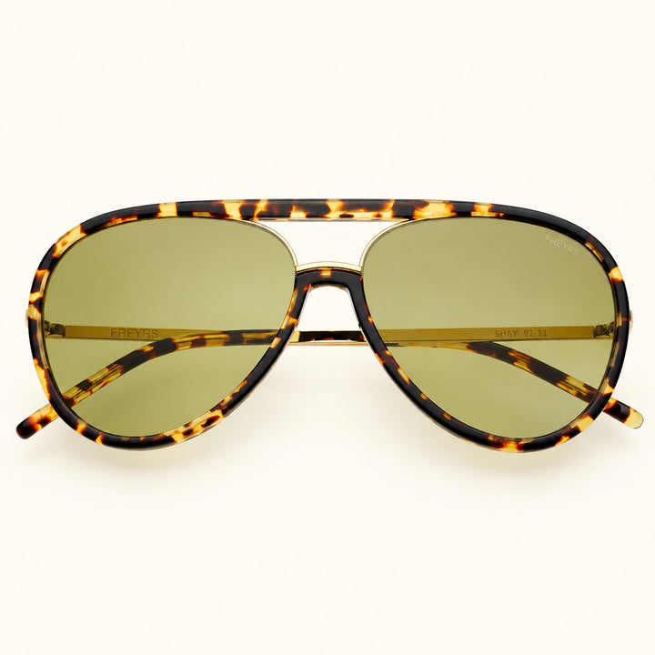 Front view of FREYRS Shay unisex aviator sunglasses in Tortoise / Light Green featuring tortoiseshell acetate frames, light green lenses, and a gold-tone double-bridge design.