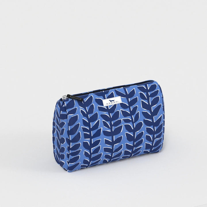 Blue patterned cosmetic bag on a light gray background