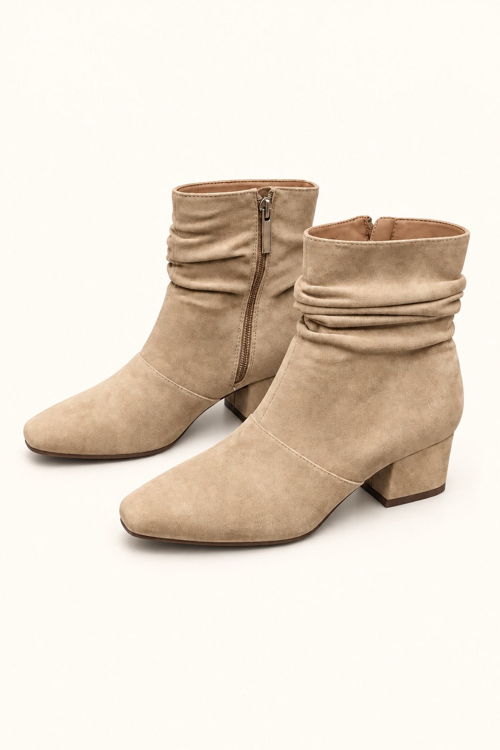 Corkys Addicted sand faux suede ankle boots with slouchy ruched shafts, side zipper closures, square toes, and low block heels.