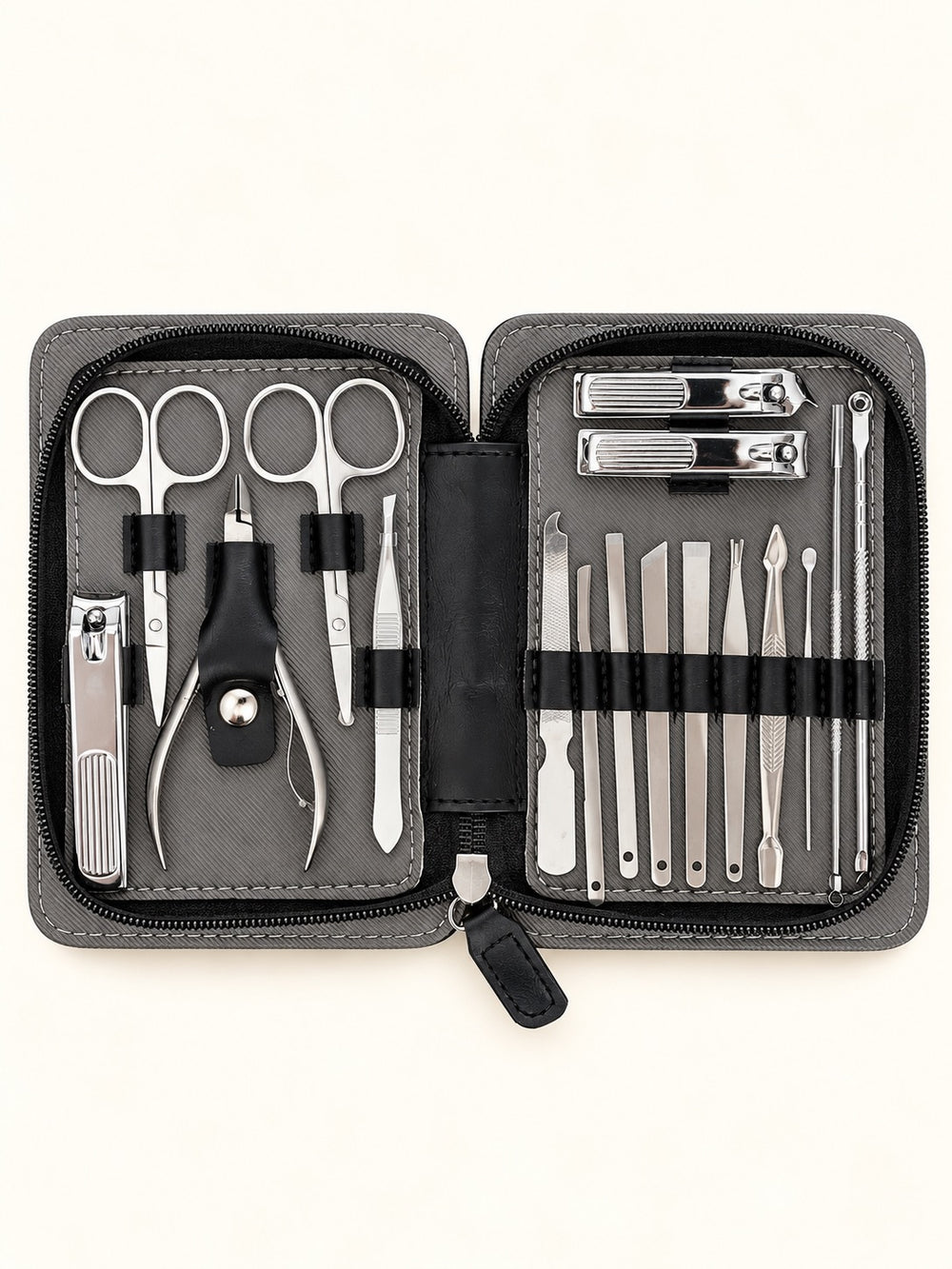 Overhead product photo of black Pro MAN-I PEDI 17 Piece Set showing stainless steel grooming tools organized in elastic holders.