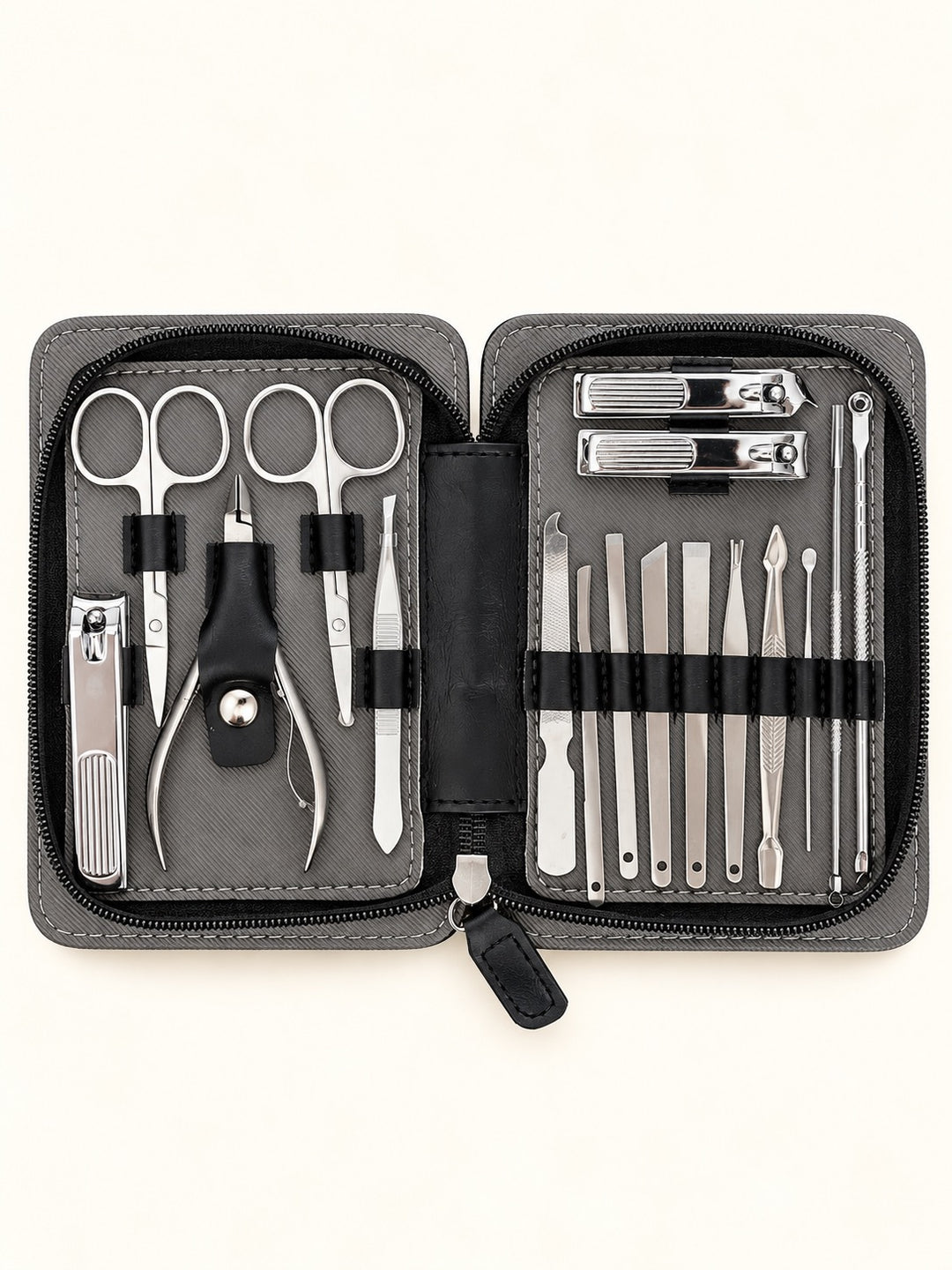 Overhead product photo of black Pro MAN-I PEDI 17 Piece Set showing stainless steel grooming tools organized in elastic holders.