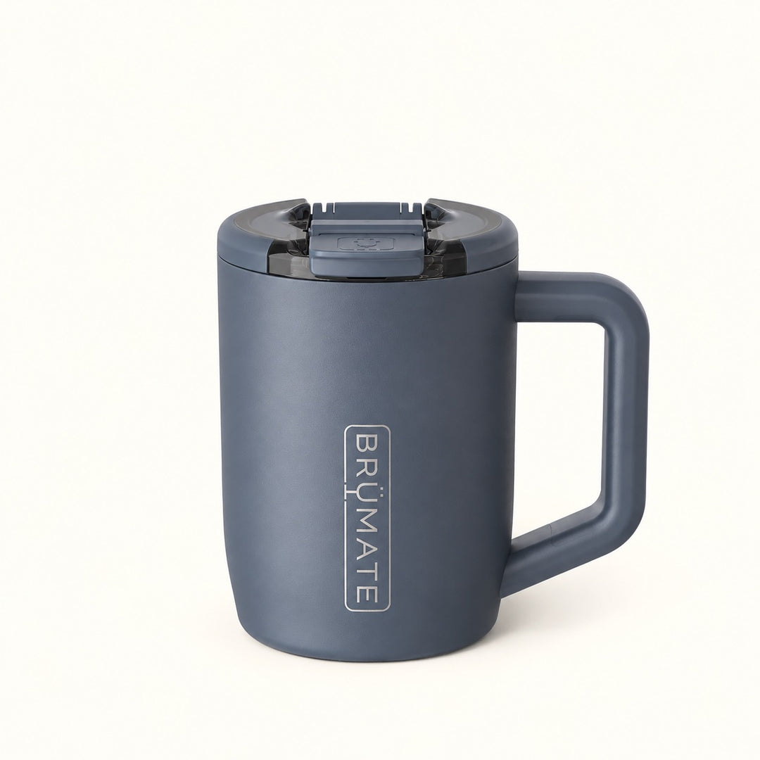 A dark slate blue insulated mug with a matching handle and lid, featuring the vertical &