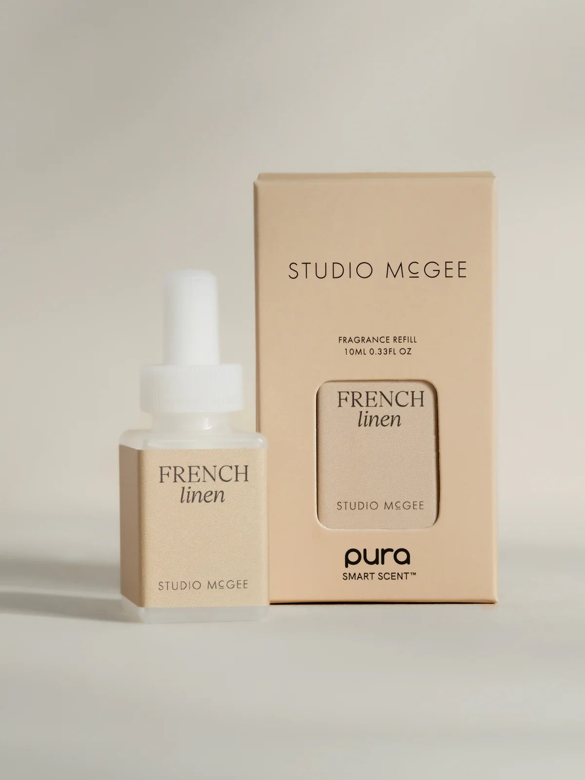 Studio McGee French Linen Pura home fragrance refill bottle and packaging