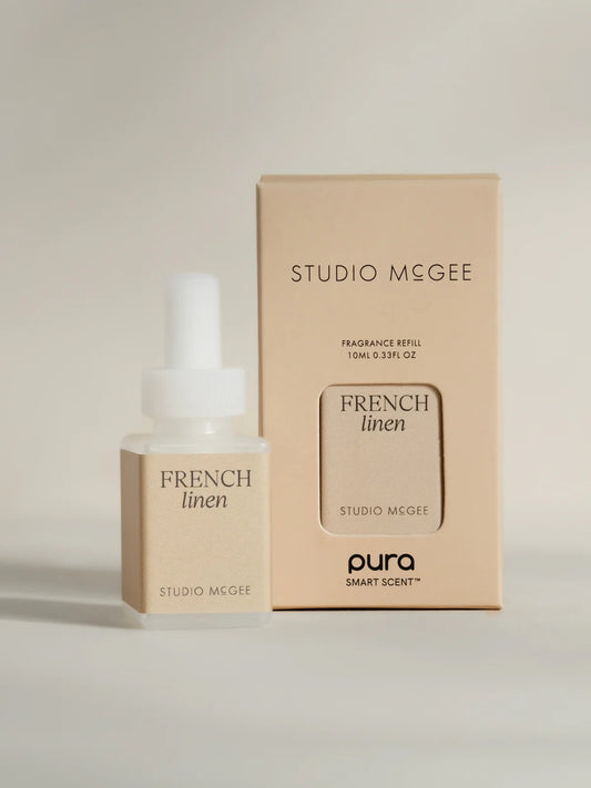 Studio McGee French Linen Pura home fragrance refill bottle and packaging