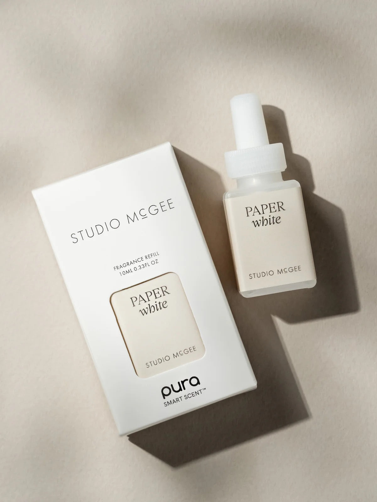Studio McGee Paper White Pura smart home fragrance refill bottle and packaging