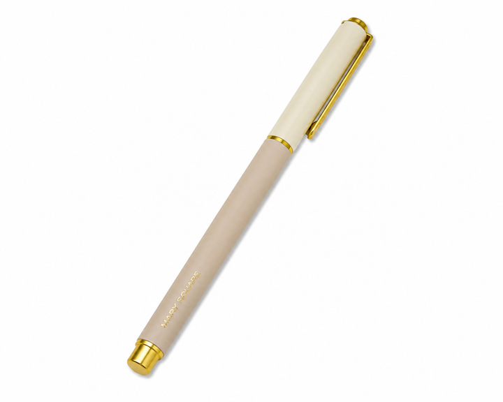 Beige and cream Snap Cap Colorblock Pen by Mary Square with elegant gold accents on a white studio background.