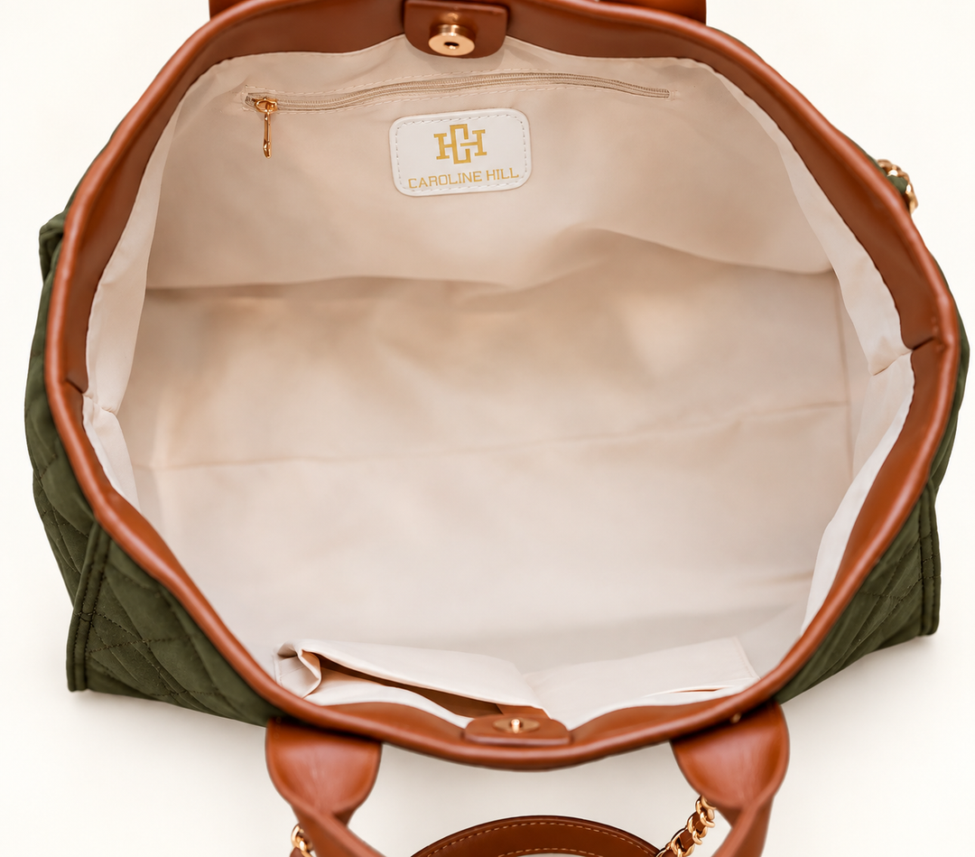 Interior view of the olive Caroline Hill Missy Tote showing cream lining, one zippered pocket, two open pockets, brown trim, and a magnetic closure.