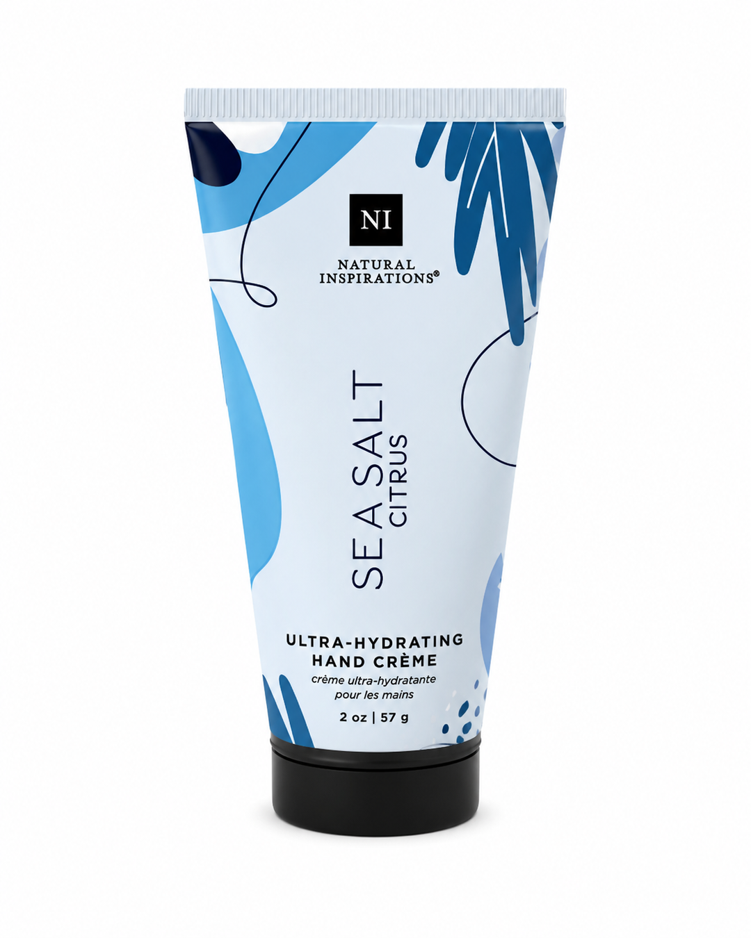 Natural Inspirations Sea Salt Citrus Ultra-Hydrating Hand Crème (2 oz / 57 g) in a light blue squeeze tube with bold blue abstract accents and a black flip-top cap, isolated on a clean white background.
