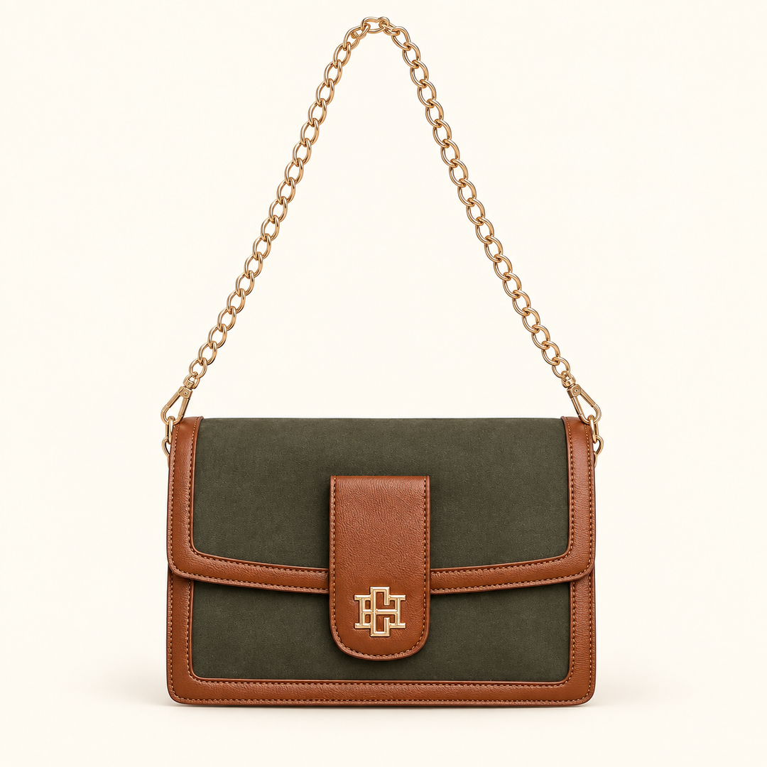 Olive Collins Crossbody displayed with its removable gold chain strap, brown vegan leather trim, foldover flap, and gold logo hardware.