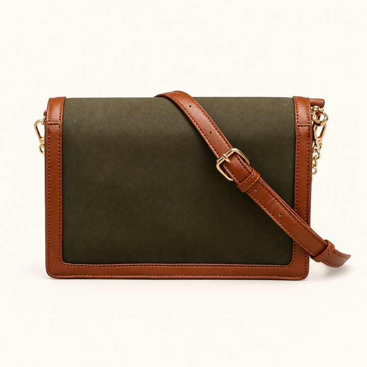Back view of the Olive Collins Crossbody featuring a suede-feel panel, contrasting brown trim, gold hardware, and an adjustable strap.