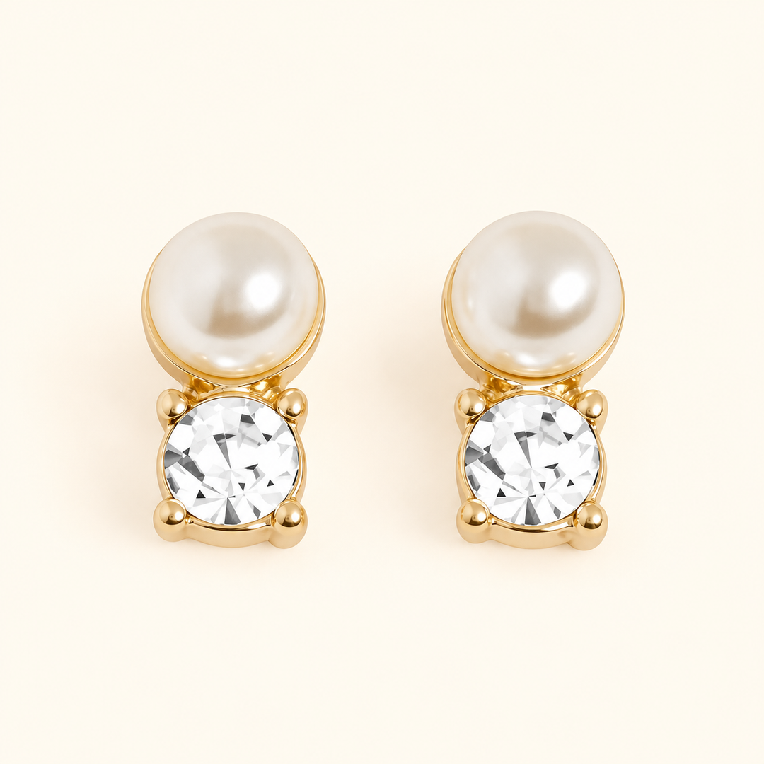 Quarter-inch pearl and crystal stud earrings featuring ivory faux pearls, sparkling clear rhinestones, and gold-tone settings on a cream background.