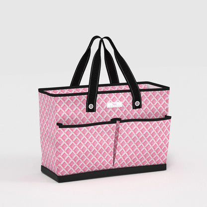 Angled view of Ben Pocket Tote Bag in Garden Gate pink lattice pattern, roomy everyday tote with exterior storage pockets and reinforced base.