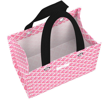 Top view of Gift Bag Small in Garden Gate pink lattice print, open reusable gift bag with structured sides and black handles.