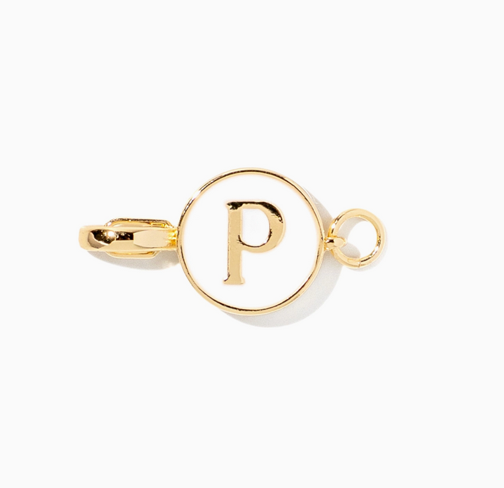 A gold-toned metal letter P initial charm with a circular bezel setting and a small loop, shown on a plain white background.