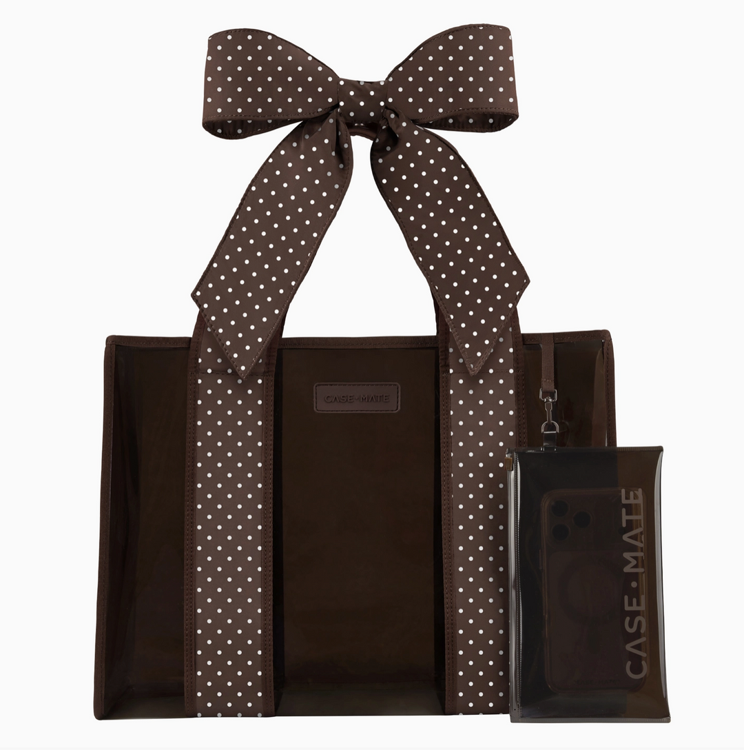 Case-Mate Espresso Polka Dot Bow Jelly Tote Bag featuring a translucent brown tote, oversized brown and white polka dot bow straps, and removable phone pouch