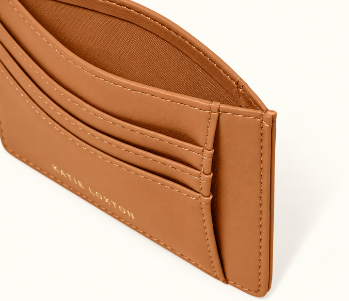 Close-up of Katie Loxton Lily Cardholder in Cognac showing layered card slots, additional pocket compartment, and tonal stitching.