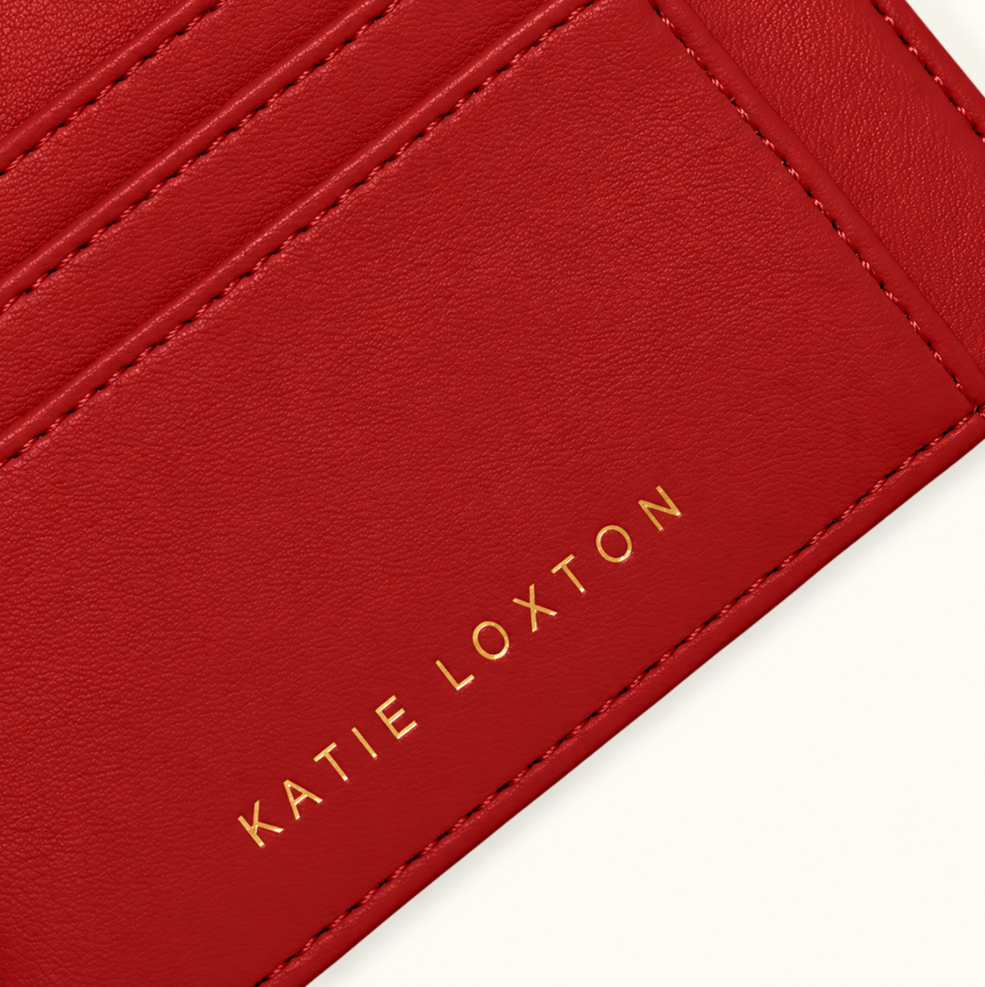 Close-up of Garnet Red vegan leather Katie Loxton Lily Cardholder showing textured finish, detailed stitching, and gold Katie Loxton logo.