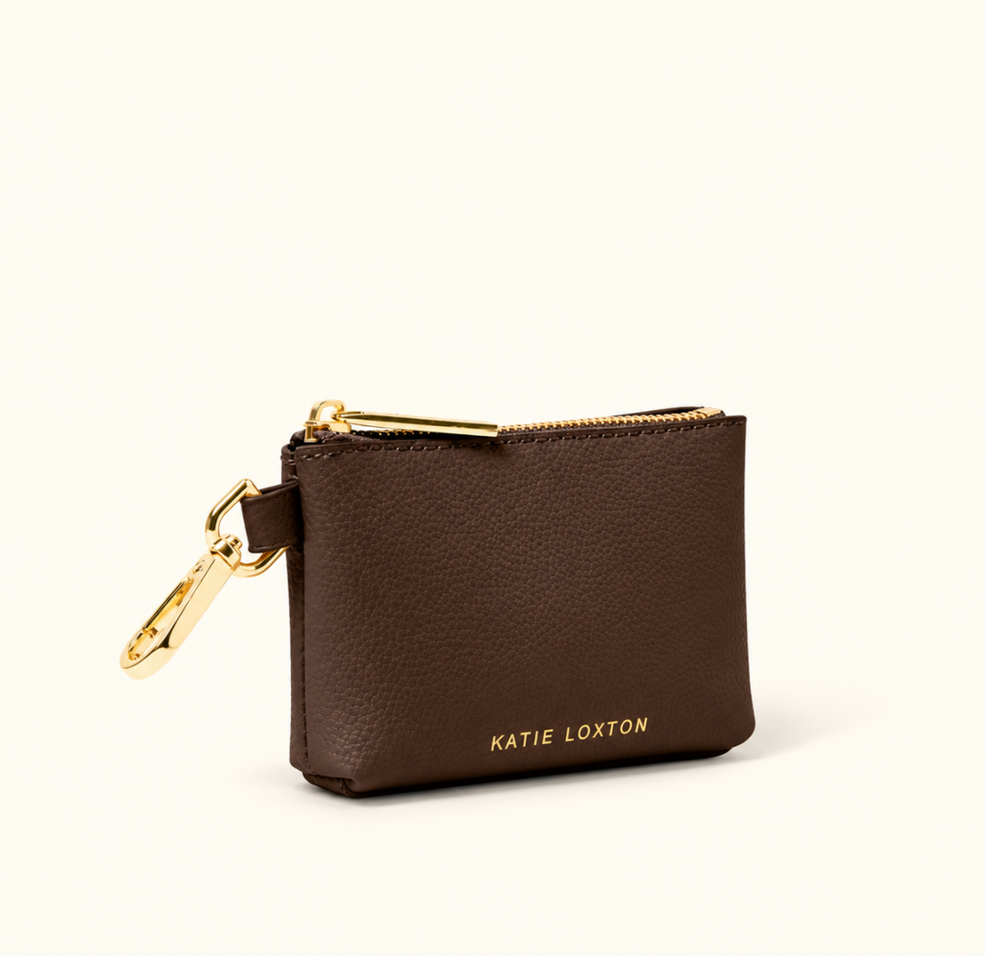 Katie Loxton Evie Clip-On Coin Purse in Chocolate with pebbled vegan leather, gold logo, zip closure and gold clip hardware.