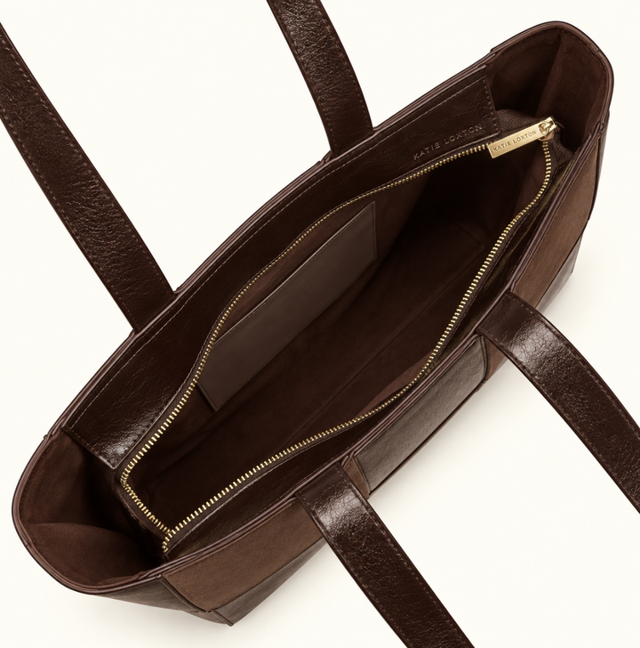 Interior of Katie Loxton Taya Woven Tote Bag in Bitter Chocolate showing spacious compartments and gold-tone zip closure