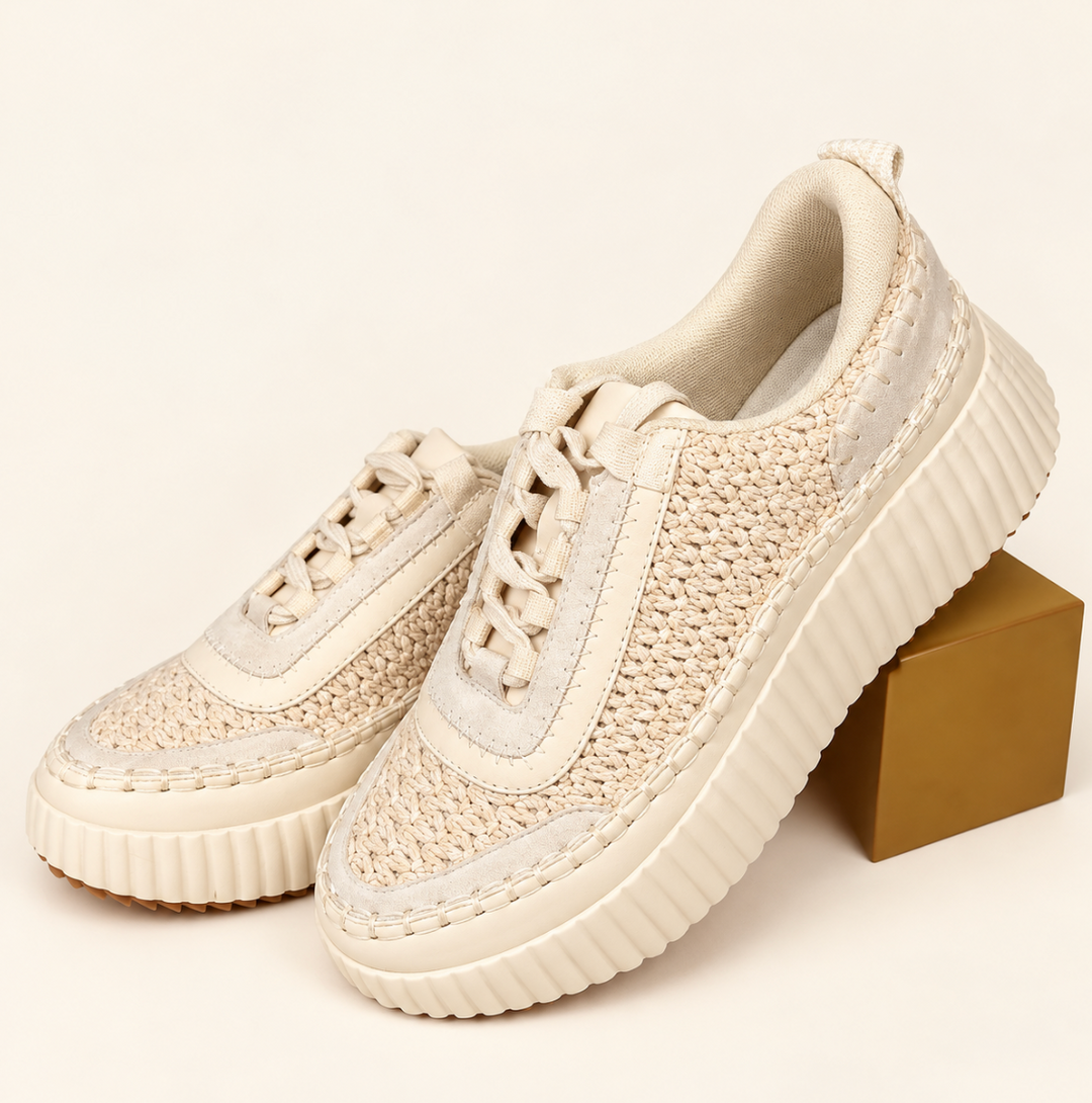 Pair of cream Dolea Platform Sneakers featuring breathable woven uppers, lace-up closures, and chunky lightweight platform soles on a cream background.