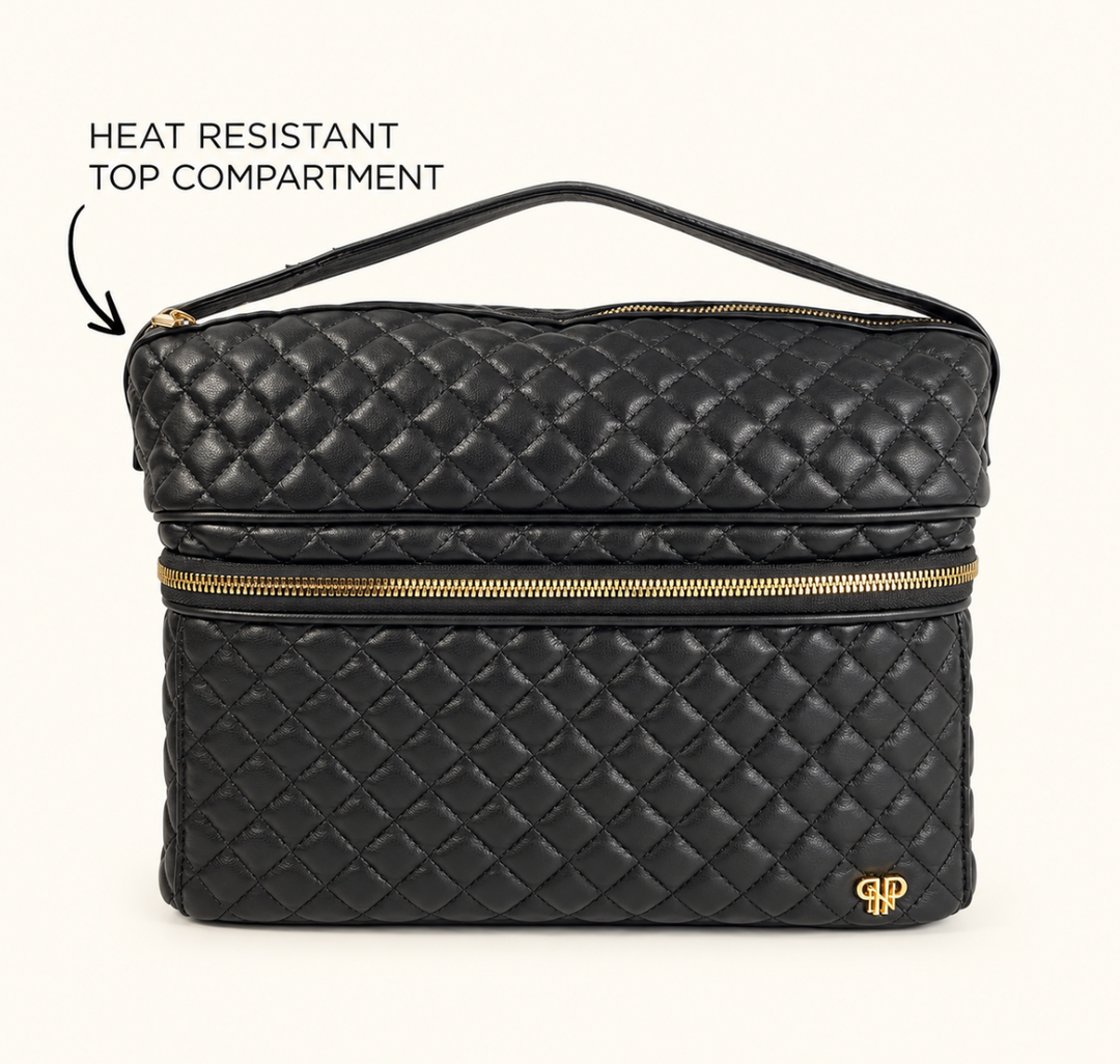 Black quilted makeup and travel organizer bag featuring a heat-resistant top compartment, gold zipper hardware, and carrying handle on a cream background.