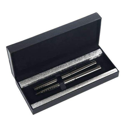 Set of pens in a black box with a white background